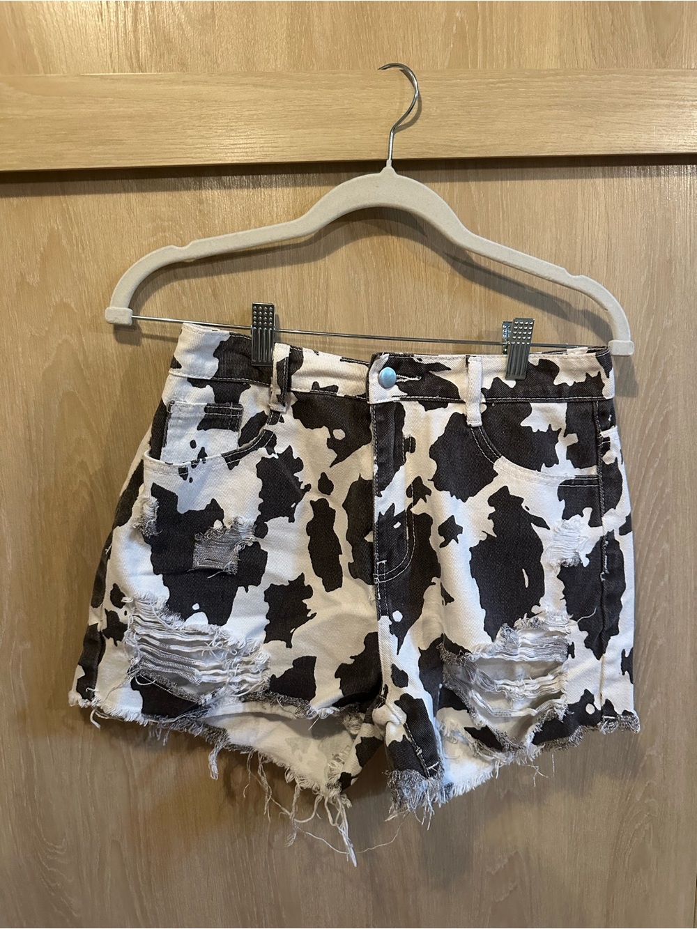 Cow-Print Distressed Women’s Denim Shorts - Black & White